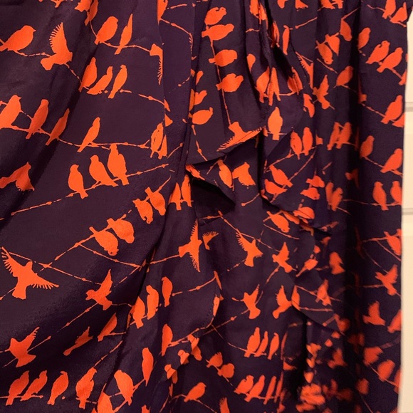 Unique purple dress with reddish orange birds. - Picture 5 of 7